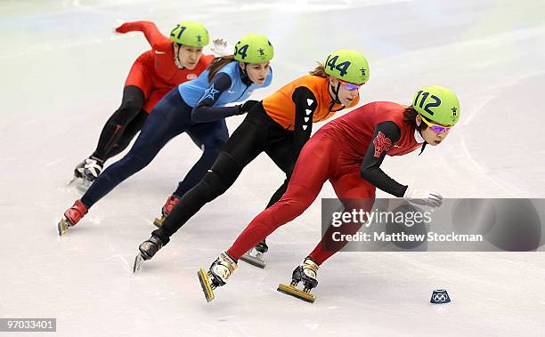 Wang Meng of China leads Annita Van Doorn of Netherlands, Kimberly Derrick of the United States and Han Yueshuang of Hong Kong, China in the Short...