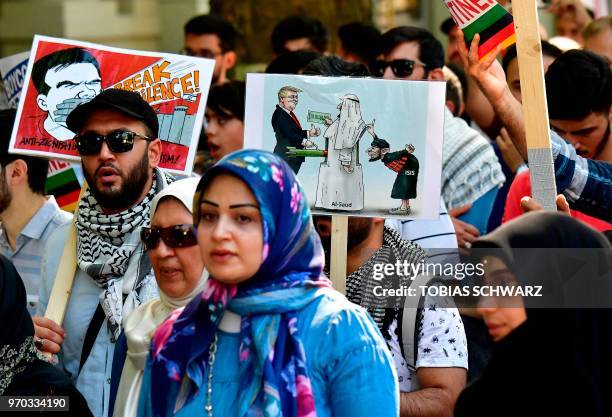 Protesters take part in a Quds-day Demonstration on the occasion of the so-called "Al-Quds day" in Berlin, on June 9, 2018. - The "Quds day" , a...