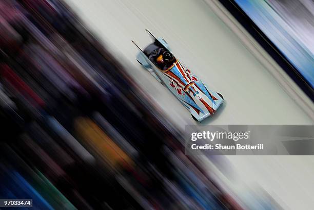 Sandra Kiriasis and Christin Senkel of Germany compete in Germany 1 during the women's bobsleigh on day 13 of the 2010 Vancouver Winter Olympics at...