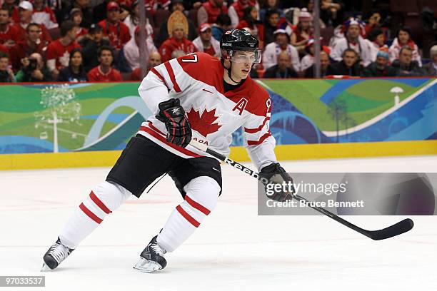 Sidney Crosby of Canada controls the puck during the ice hockey men's quarter final game between Russia and Canada on day 13 of the Vancouver 2010...