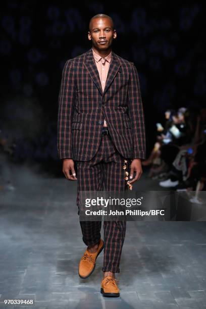 Eric Underwood walks the runway at the Oliver Spencer show during London Fashion Week Men's June 2018 at BFC Show Space on June 9, 2018 in London,...