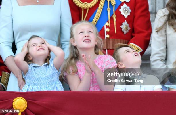 Princess Charlotte of Cambridge, Savannah Phillips and Prince George of Cambridge on the balcony of Buckingham Palace during Trooping The Colour 2018...