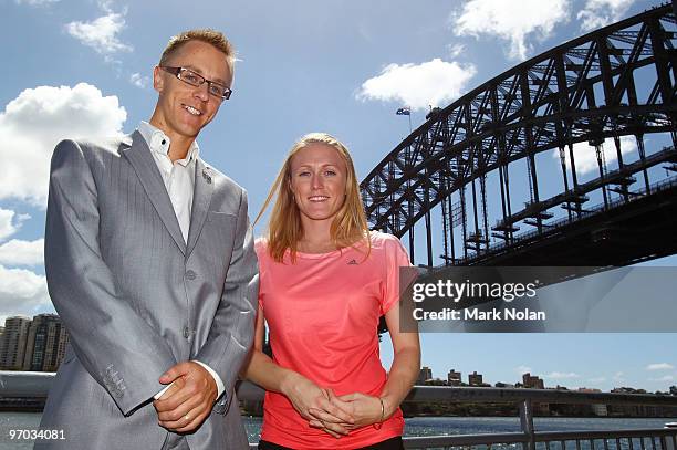 Jared Tallent and Sally McLellan of the Australian Flame pose for portraits during the John Landy Lunch and Media conference at Waters Edge on...