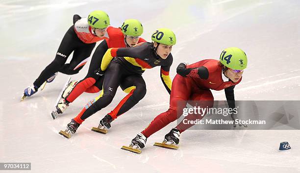 Zhou Yang of China leads Aika Klein of Germany, Erika Huszar of Hungary and Paula Bzura of Poland in the Short Track Speed Skating Ladies 1000m heat...