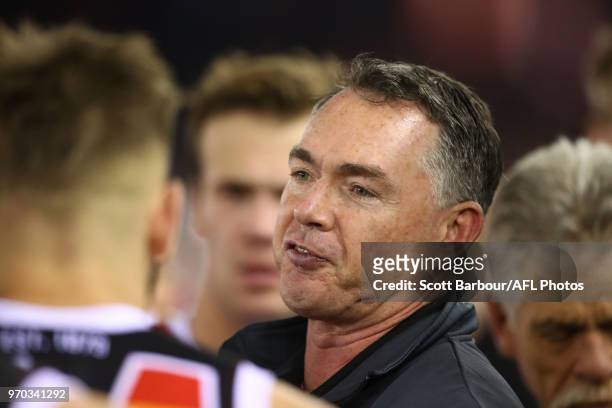 Alan Richardson, coach of the Saints speaks to his team during a quarter time break during the round 12 AFL match between the St Kilda Saints and the...