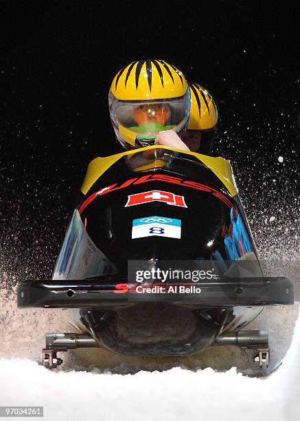 Sabina Hafner and Caroline Spahni of Switzerland compete in Switzerland 1 during the womens bobsleigh on day 13 of the 2010 Vancouver Winter Olympics...