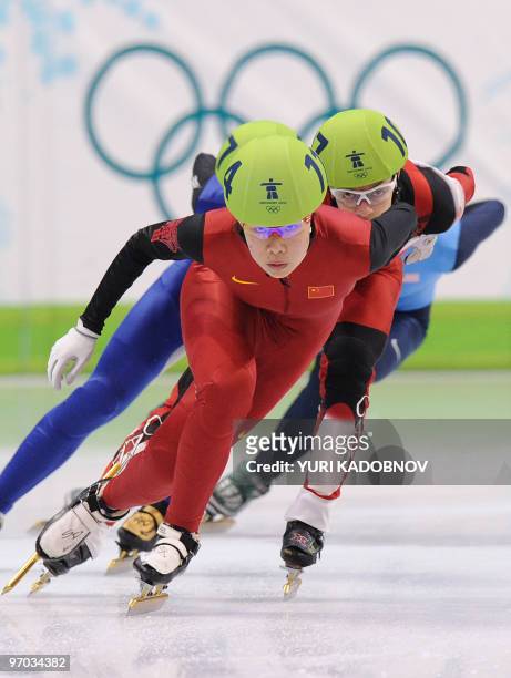 China's Yang Zhou leads the pack followed by Canada's Kalyna Roberge in the Women's Short Track Speedskating 3000m Relay final, at the Pacific...