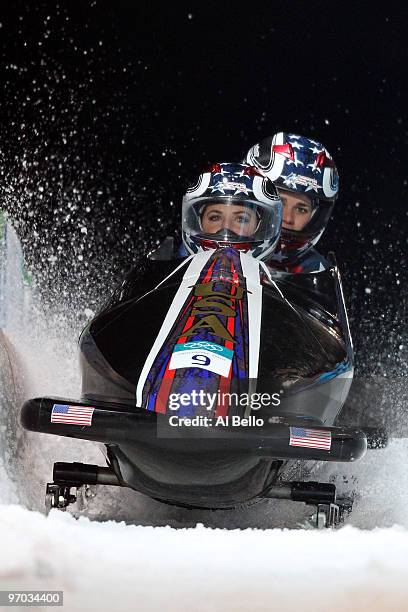 Bree Schaaf and Emily Azevedo the United States compete in USA 3 during the womens bobsleigh on day 13 of the 2010 Vancouver Winter Olympics at the...