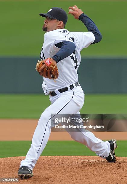 Joel Zumaya of the Detroit Tigers pitches during spring training workouts at Joker Marchant Stadium on February 24, 2010 in Lakeland, Florida.