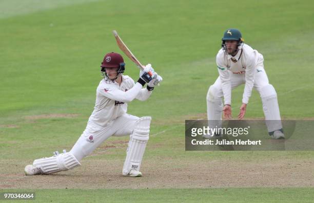 Billy Root of Nottinghamshire looks on as Tom Abell of Somerset scores runs during day one of the Specsavers County Championship Division One match...