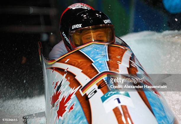 Sandra Kiriasis and Christin Senkel of Germany in Germany 1 compete during the women's bobsleigh on day 13 of the 2010 Vancouver Winter Olympics at...
