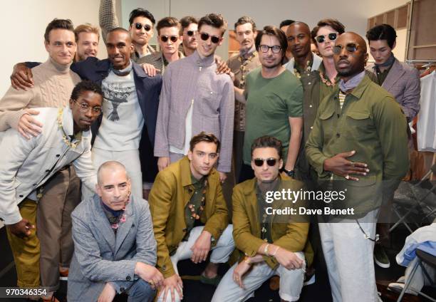 Designer Oliver Spencer poses with models backstage at the Oliver Spencer Catwalk Show SS 2019 during London Fashion Week Men's June 2018 at 180 The...