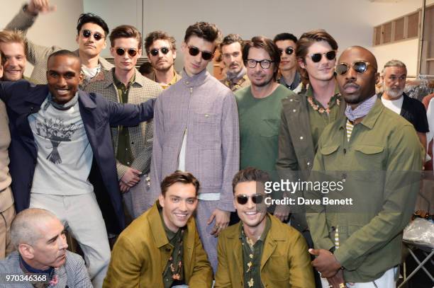 Designer Oliver Spencer poses with models backstage at the Oliver Spencer Catwalk Show SS 2019 during London Fashion Week Men's June 2018 at 180 The...