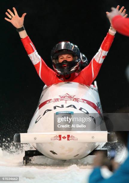 Helen Upperton and Shelly-Ann Brown of Canada in Canada 2 celebrate their fourth run during the womens bobsleigh on day 13 of the 2010 Vancouver...