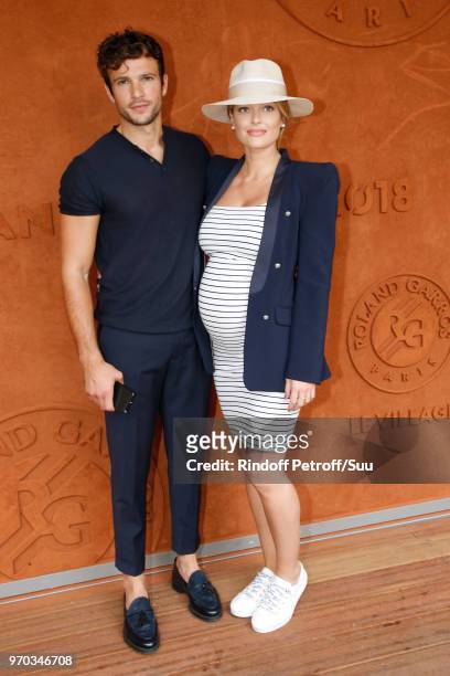 Hugo Philip and blogger Caroline Receveur attend the Women Final of the 2018 French Open - Day Fourteen at Roland Garros on June 9, 2018 in Paris,...