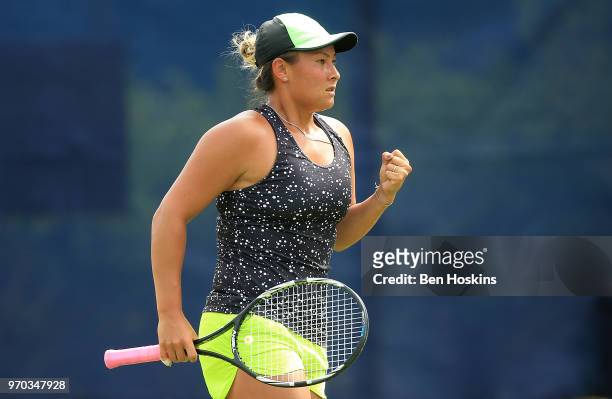 Tara Moore of Great Britain celebrates winning a point during her qualifying match against Miharu Imanishi of Japan Day One of the Nature Valley Open...