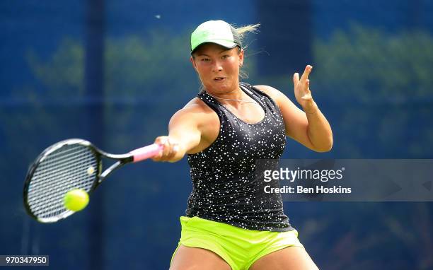 Tara Moore of Great Britain hits a forehand during her qualifying match against Miharu Imanishi of Japan Day One of the Nature Valley Open at...