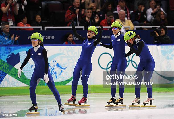 South Korea's Lee Eun-Byul, Kim Min-Jung, Cho Ha-Ri and Park Seung-Hi react after being disqualified in the Women's Short Track Speedskating 3000m...