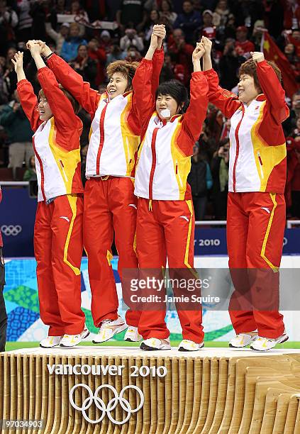 Team China celebrate winning the gold medal in the Short Track Speed Skating Ladies' 3000m relay finals on day 13 of the 2010 Vancouver Winter...