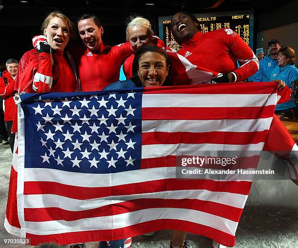 Elana Meyers of the United States celebrates in front of the canadians after the women's bobsleigh on day 13 of the 2010 Vancouver Winter Olympics at...