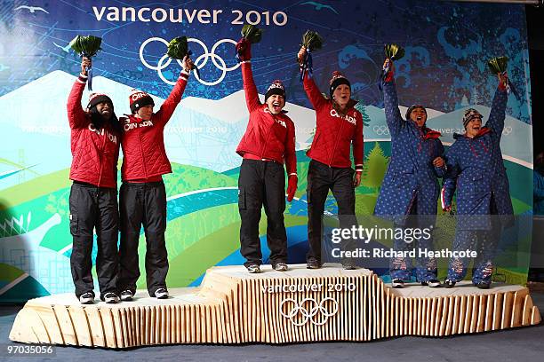 Heather Moyse and Kaillie Humphries of Canada 1 celebrate gold Helen Upperton and Shelly-Ann Brown of Canada 2 celebrate silver and Erin Pac and...
