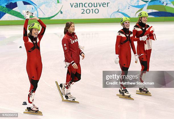 Tania Vicent, Kalyna Roberge, Marianne St-Gelais and Jessica Gregg of Canada celebrate winning the silver medal in the Short Track Speed Skating...