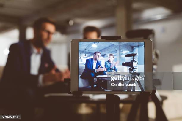 behind the scenes of a business vlog - interview event stock pictures, royalty-free photos & images