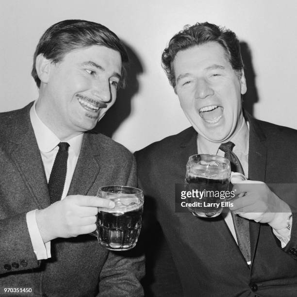 English comedian, singer, actor and variety performer Max Bygraves and English jazz musician Kenny Ball celebrating their first collaboration and...