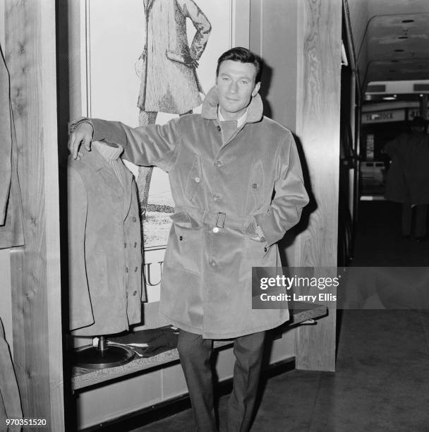 South African actor Laurence Harvey shopping in Regent Street, London, UK, 16th February 1967.