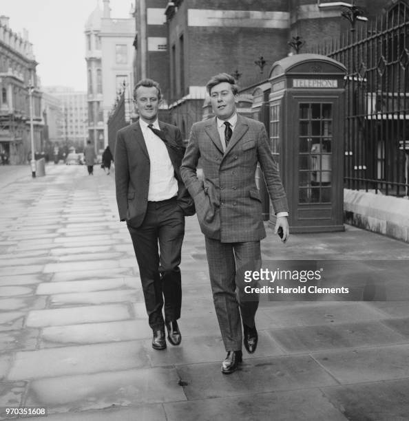 English director and producer Tony Richardson and English playwright, screenwriter and actor John Osborne outside the High Court of Justice for a...