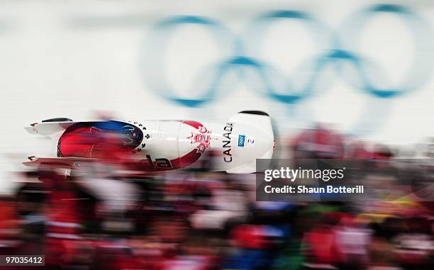 Kaillie Humphries and Heather Moyse of Canada in Canada 1 compete their fourth run during the womens bobsleigh on day 13 of the 2010 Vancouver Winter...