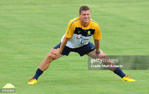 Jason Culina stretches during an Australian Socceroos training session at Carrara Stadium on February 25, 2010 in Gold Coast, Australia.