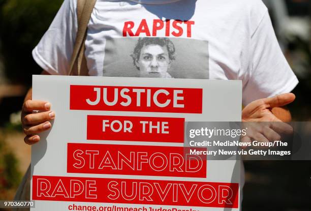 Jonathan Ross holds a picket sign during a protest asking for the impeachment of Santa Clara County Superior Court Judge Aaron Persky at the Old...