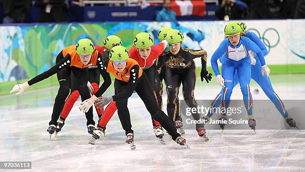 Sanne Van Kerkhof of Netherlands leads in the Short Track Speed Skating Ladies 3000m relay finals on day 13 of the 2010 Vancouver Winter Olympics at...