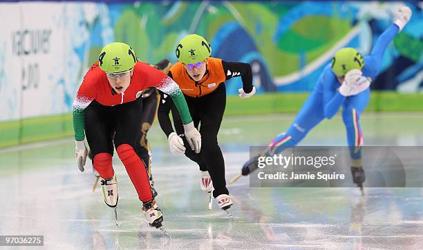 Erika Huszar of Hungary and Maaike Vos of Netherlands compete in the Short Track Speed Skating Ladies 3000m relay finals on day 13 of the 2010...