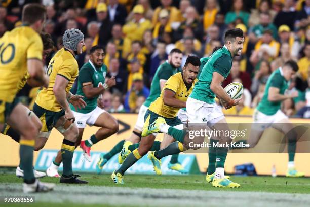 Conor Murray of Ireland makes a break during the International Test match between the Australian Wallabies and Ireland at Suncorp Stadium on June 9,...