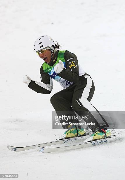 Lydia Lassila of Australia celebrates on the way to winning the gold medal during the freestyle skiing ladies' aerials final on day 13 of the...