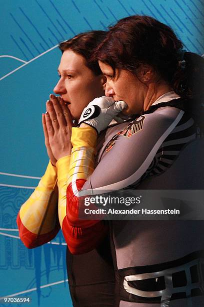 Sandra Kiriasis and Christin Senkel of Germany reacts after their fourth run during the women's bobsleigh on day 13 of the 2010 Vancouver Winter...