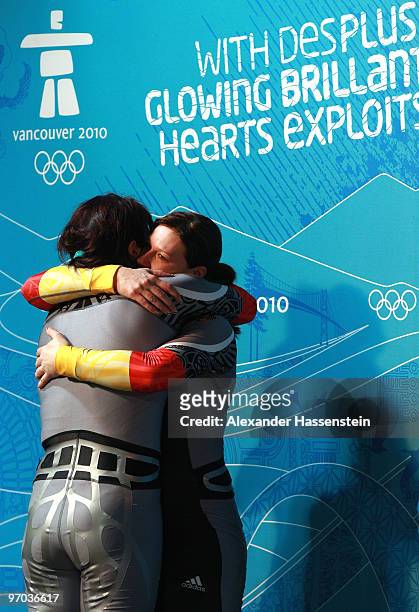Sandra Kiriasis and Christin Senkel of Germany reacts after their fourth run during the women's bobsleigh on day 13 of the 2010 Vancouver Winter...