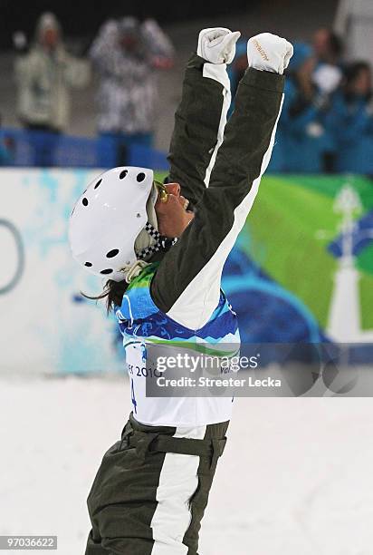 Lydia Lassila of Australia celebrates on the way to winning the gold medal during the freestyle skiing ladies' aerials final on day 13 of the...