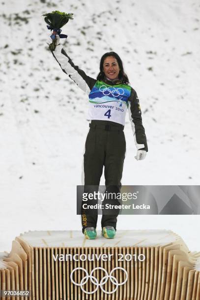 Lydia Lassila of Australia celebrates goal during the flower ceremony for during the freestyle skiing ladies' aerials final on day 13 of the...