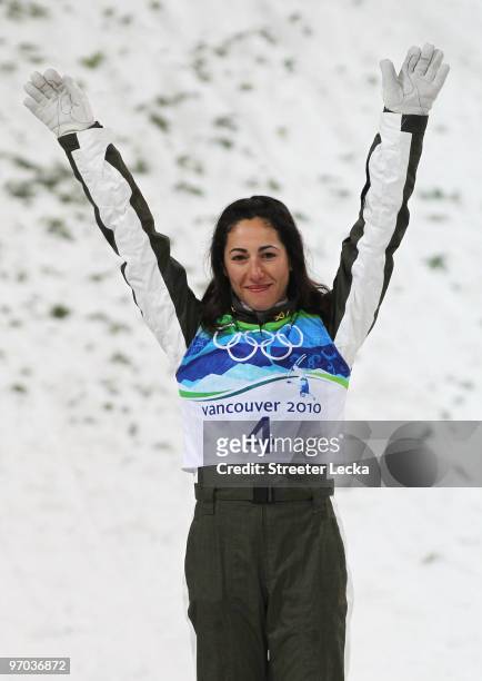 Lydia Lassila of Australia celebrates goal during the flower ceremony for during the freestyle skiing ladies' aerials final on day 13 of the...