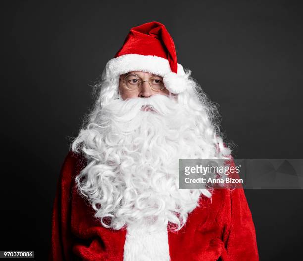 portrait of tired santa, studio shot. debica, poland - lazy poland stock pictures, royalty-free photos & images