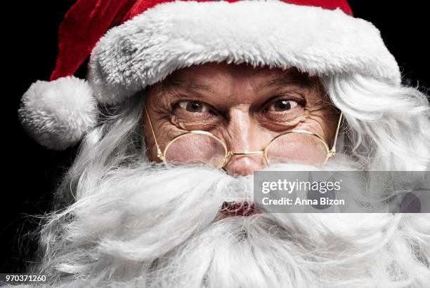 close up of  santa claus's face. debica, poland - santa face fotografías e imágenes de stock