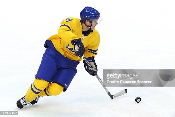 Tobias Enstrom of Sweden moves the puck in the first period during the ice hockey men's quarter final game between Sweden and Slovakia on day 13 of...