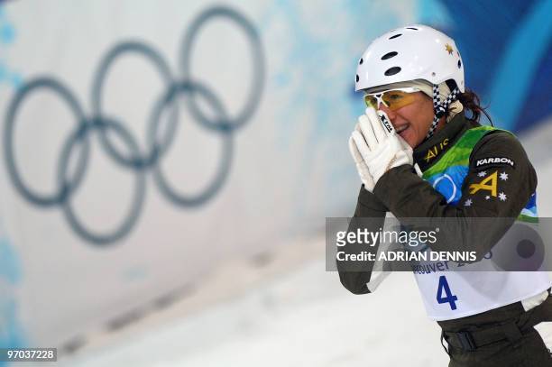 Australia's gold medalist Lydia Lassila reacts during the Freestyle Skiing women's aerial finals at Cypress Mountain, north of Vancouver during the...