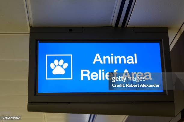 Sign in the terminal at Phoenix Sky Harbor International Airport in Phoenix, Arizona, indicates the location of an 'Animal Relief Area'.