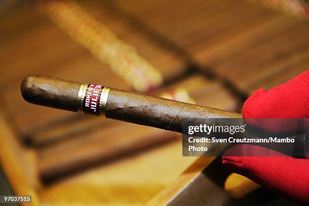 Model hands out the new "Julieta" cigar to guests on February 24 in Havana, Cuba. In response to cigar sales lagging, Cuba is trying to interest...