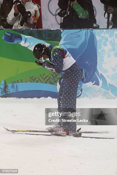 Emily Cook of the United States reacts after crashing on her first jump during the freestyle skiing ladies' aerials final on day 13 of the Vancouver...