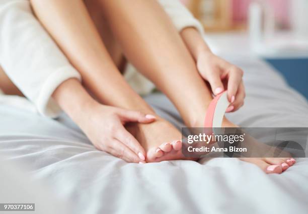 woman doing pedicure. debica, poland - anna bizon stock pictures, royalty-free photos & images